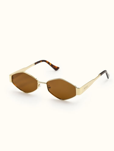 Gold-framed sunglasses with brown lenses on a white background